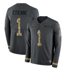 Men's Nike Jacksonville Jaguars #1 Travis Etienne Anthracite Salute To Service Stitched NFL Limited Therma Long Sleeve Jersey