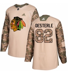 Men's Adidas Chicago Blackhawks #82 Jordan Oesterle Authentic Camo Veterans Day Practice NHL Jersey