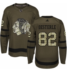 Men's Adidas Chicago Blackhawks #82 Jordan Oesterle Authentic Green Salute to Service NHL Jersey