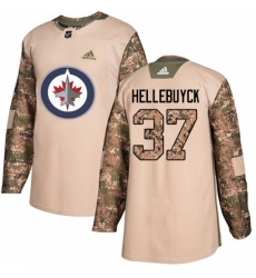 Men's Adidas Winnipeg Jets #37 Connor Hellebuyck Authentic Camo Veterans Day Practice NHL Jersey